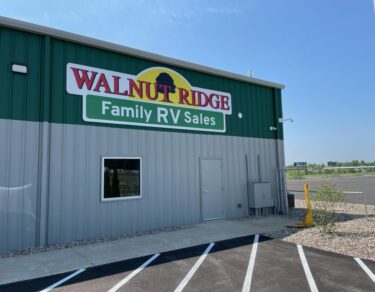 Walnut Ridge Family RV Sales Signage on side of building