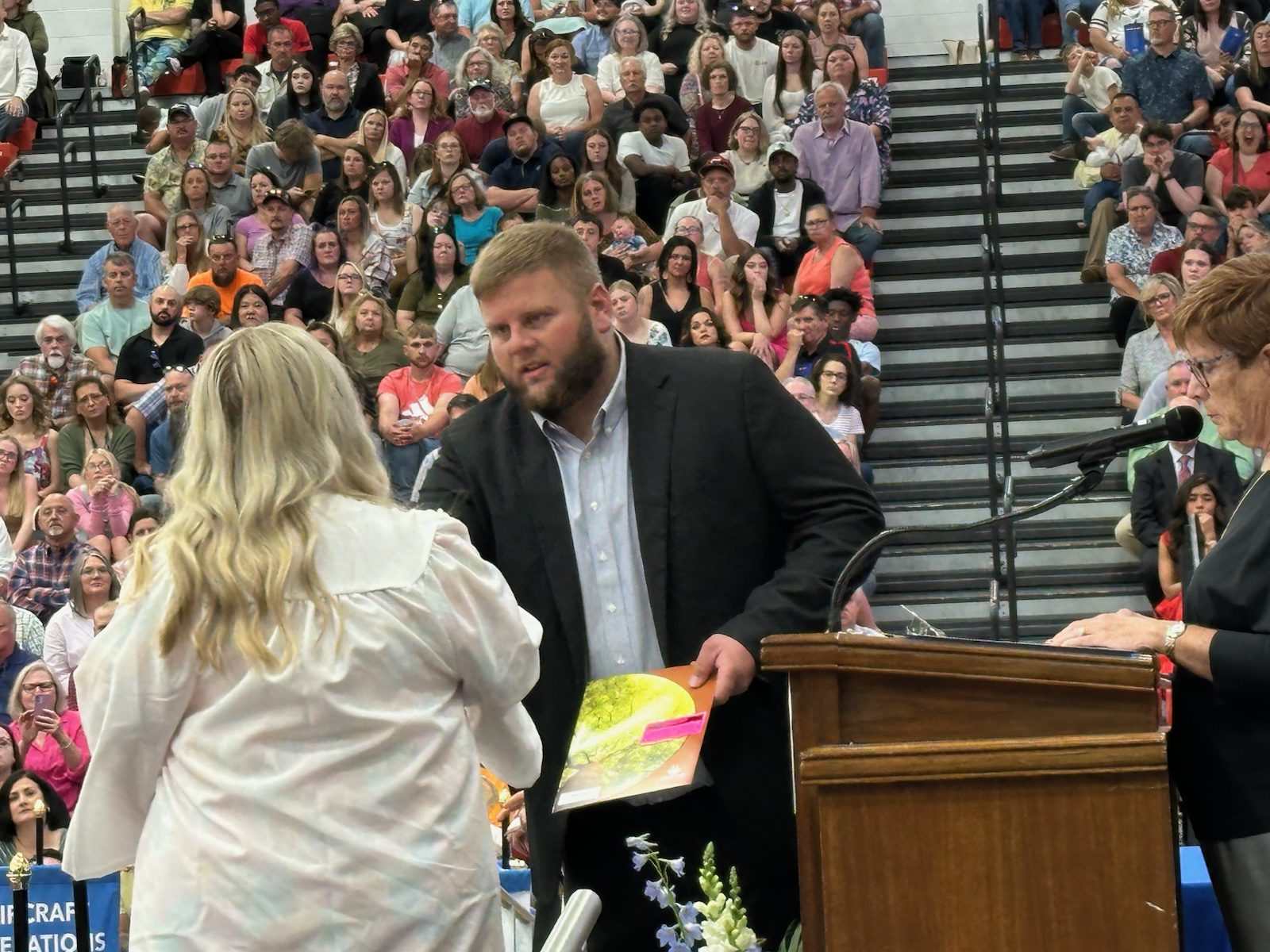 Daniel Shireman awards a scholarship.